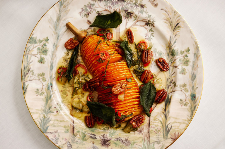 This shows a close up of the Hasselback butternut squash with maple pecans and crispy sage dish, on Tall Trees crockery, from the thanksgiving menu at Brasserie Max, Covent Garden Hotel.