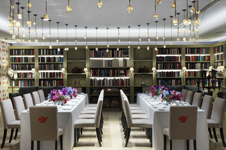 Long dining tables set-up in the Reading private events room at the Whitby Hotel