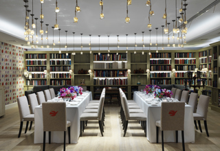 Long dining tables set-up in the Reading private events room at the Whitby Hotel