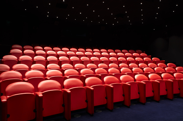 Diagonal shot of the large screening private events room at the Soho Hotel