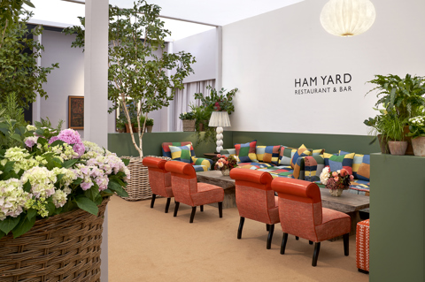 A wide shot of the lounge area in Ham Yard Restaurant at Frieze Masters designed by Kit Kemp Design Studio
