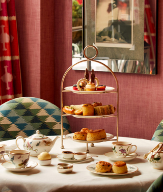 A portrait shot of London Calling Afternoon Tea at Haymarket Hotel on a table