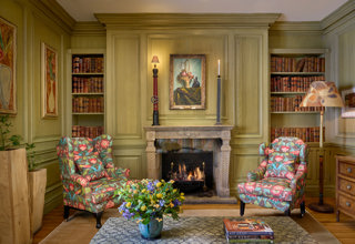 Close shot of the fireplace in the Library at Charlotte Street Hotel