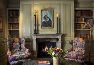 Close shot of the fireplace in the Library at Charlotte Street Hotel