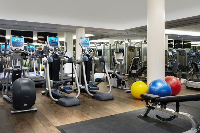 The gym at Ham Yard Hote featuring cross trainers and running machines