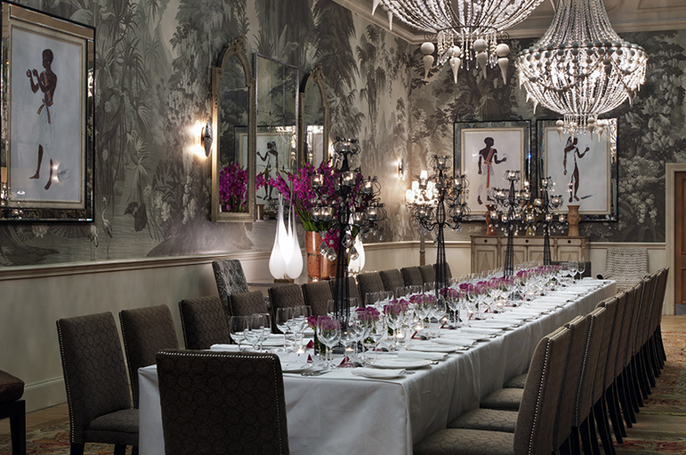 Long dining table in the Shooting Gallery private events room at Haymarket Hotel