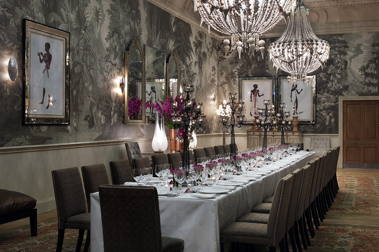Long dining table in the Shooting Gallery private events room at Haymarket Hotel