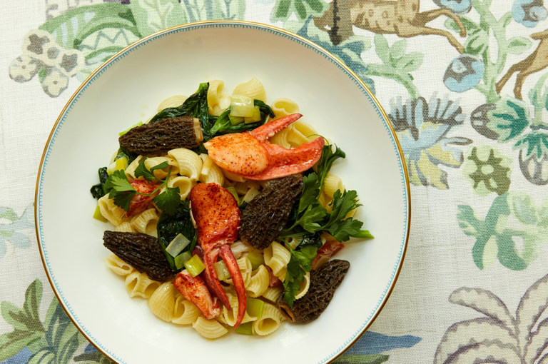 A close up shot of a seasonal pasta dish with seafood in a bowl, at the Whitby Bar.