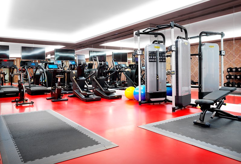 An image of the gym t the Whitby Hotel. The image shows the gym and all the equipment lined up in the room.