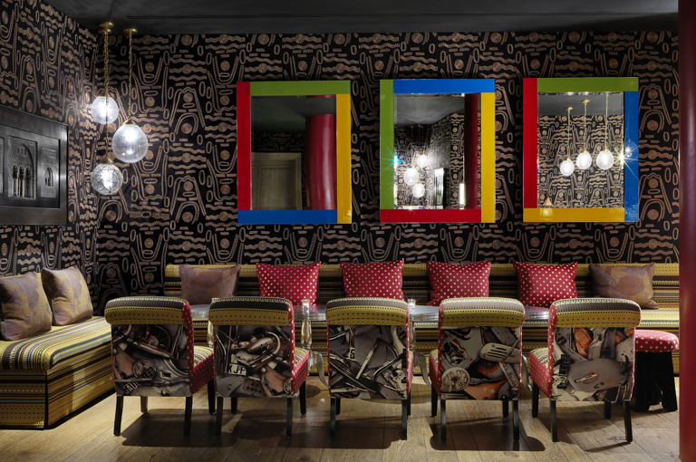 Side shot of the Crimson Bar private events room at the Soho Hotel