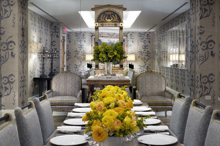 Close shot of a long dining table set-up in the Lafayette private events room at Crosby Street Hotel