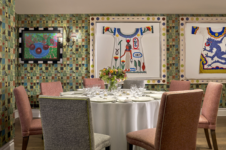 A close shot a round dining table in the Vanessa Bell private events room at Charlotte Street Hotel