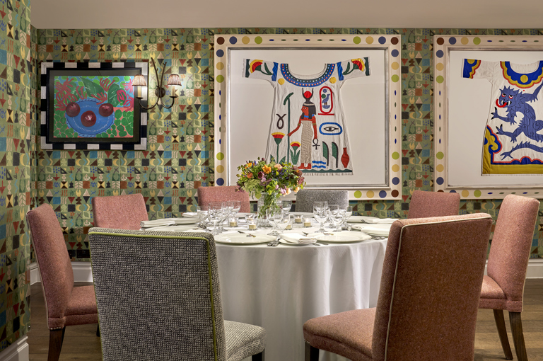 A close shot a round dining table in the Vanessa Bell private events room at Charlotte Street Hotel