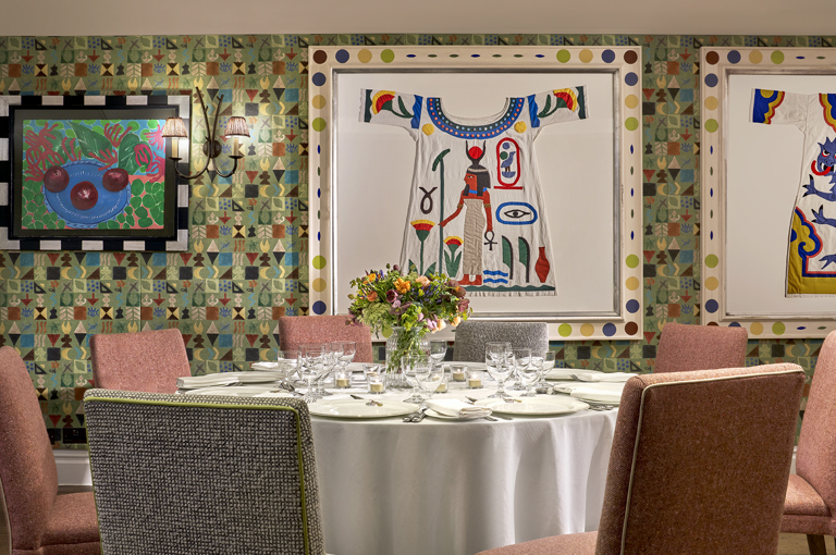 A close shot a round dining table in the Vanessa Bell private events room at Charlotte Street Hotel