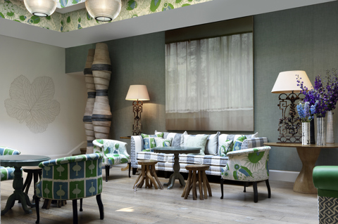 Wide shot of the lounge area of the Conservatory at Haymarket Hotel