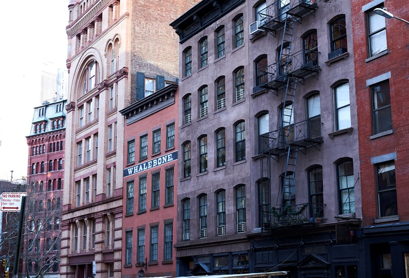A street of industrial warehouse-style buildings in Tribeca, New York