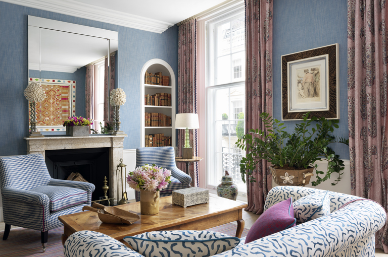 A diagonal shot of the sitting area of the Drawing Room in The Townhouse at Haymarket Hotel