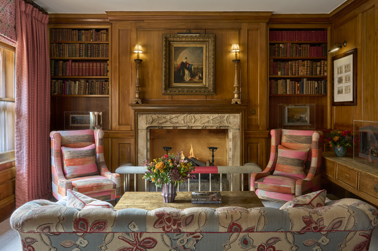 Close shot of the fireplace of the Library at Covent Garden Hotel