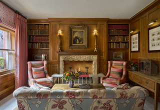 Close shot of the fireplace of the Library at Covent Garden Hotel