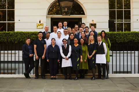 The team at Dorset Square Hotel stand outside the front of the building