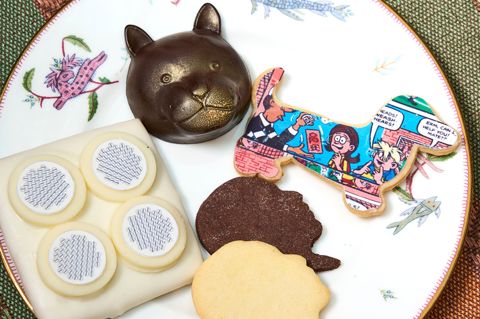 A close-up of a plate of cookies inspired by artworks at Firmdale Hotels, served as part of Willow's Art Walk at Crosby Street Hotel