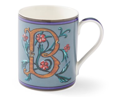 The "B" Alphabet Mug features a gold "B" on a blue mug , which forms the ideal structure to support the abundance of this climbing plant, bursting with red flowers, and woven into the letter's form. The Design features on both sides of the Mug