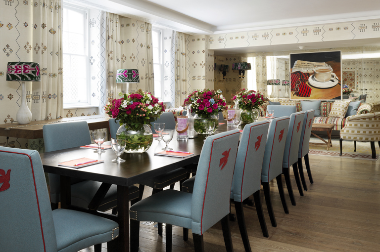 Long meeting table in the Rocklin private events room at Haymarket Hotel