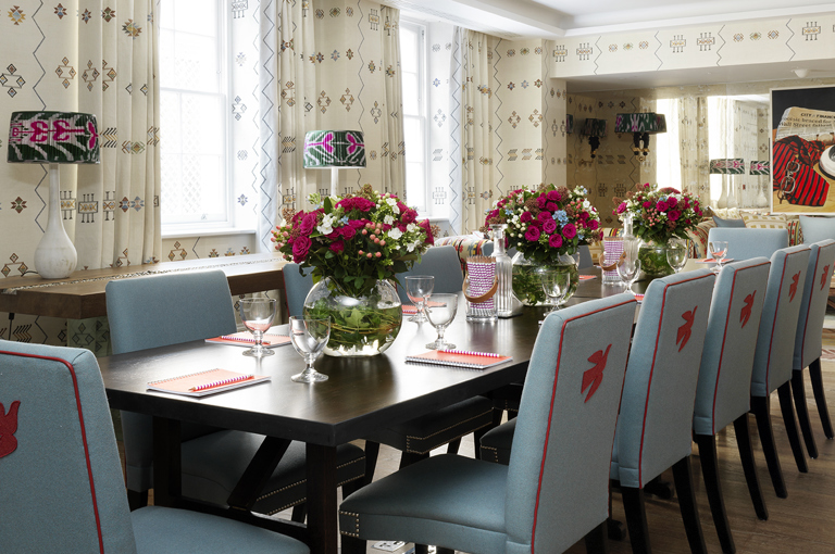 Long meeting table in the Rocklin private events room at Haymarket Hotel