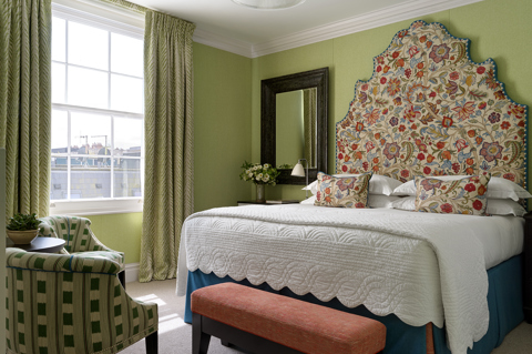 Bedroom shot of room 201, a Deluxe King Room at Dorset Square Hotel