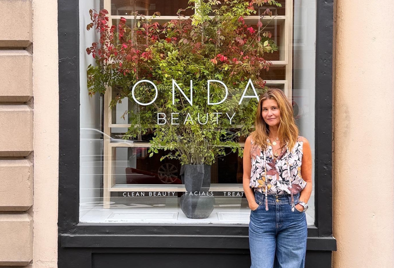 Onda Beauty Co-Founder Larissa Thomson stands outside her store in Tribeca New York
