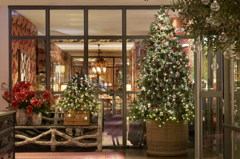 Wide shot of the Christmas tree and decorations in the lobby at The Soho Hotel