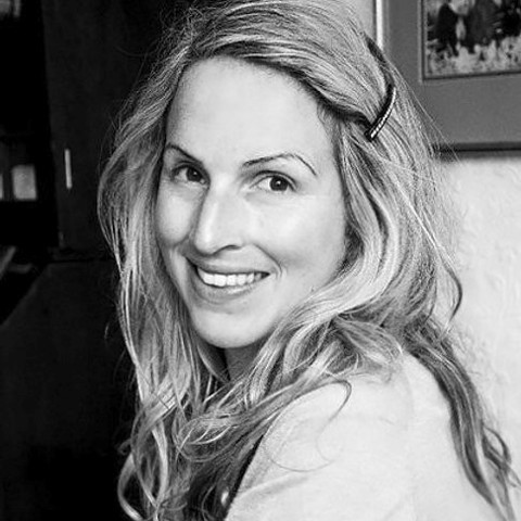 A black and white headshot of editor and author Fiona McKenzie Johnston