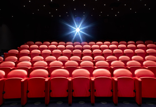 Wide shot of the large screening private events room at the Soho Hotel