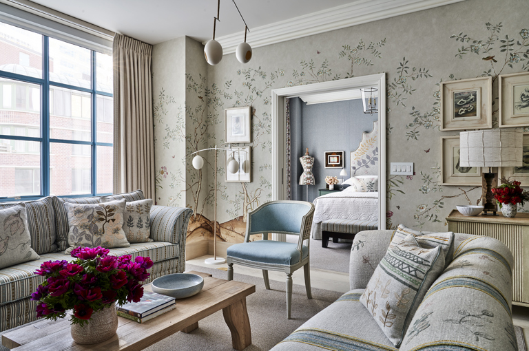 Diagonal shot looking through the living room to the bedroom of Songbird Suite, 704 at Warren Street Hotel