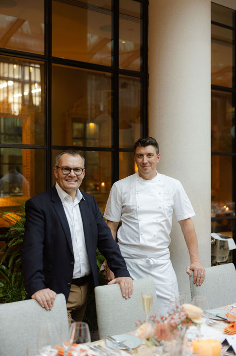 Wine maker Benoit Dehu stands with Firmdale's Group Head Chef, Joe Fox in The Orangery at Ham Yard Hotel 