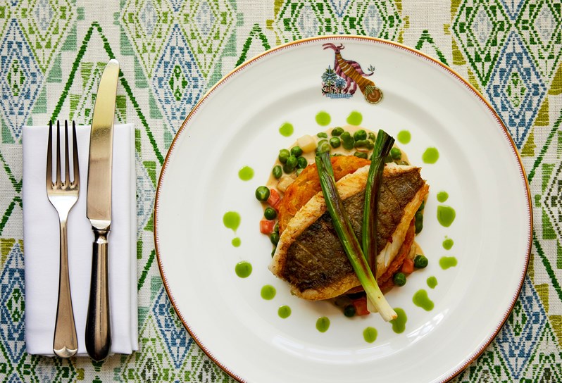 An image of a fish dish, from the A La Carte Menu at Refuel, Soho Hotel.