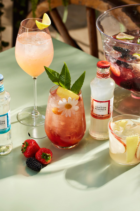 A close-up portrait shot of a selection of Wimbledon cocktails at Ham Yard Bar & Restaurant being served outside