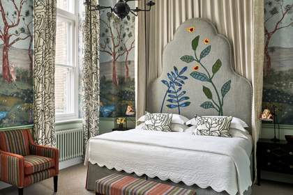 A diagonal image of the bed in the Deluxe Room, 107 in Charlotte Street Hotel.