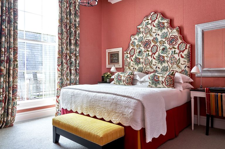 Bedroom shot of room 101, a Deluxe King Room at Dorset Square Hotel