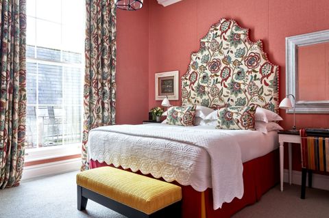 Bedroom shot of room 101, a Deluxe King Room at Dorset Square Hotel