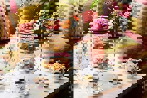 Wide shot of Summer Afternoon Tea in the drawing room at The Soho Hotel