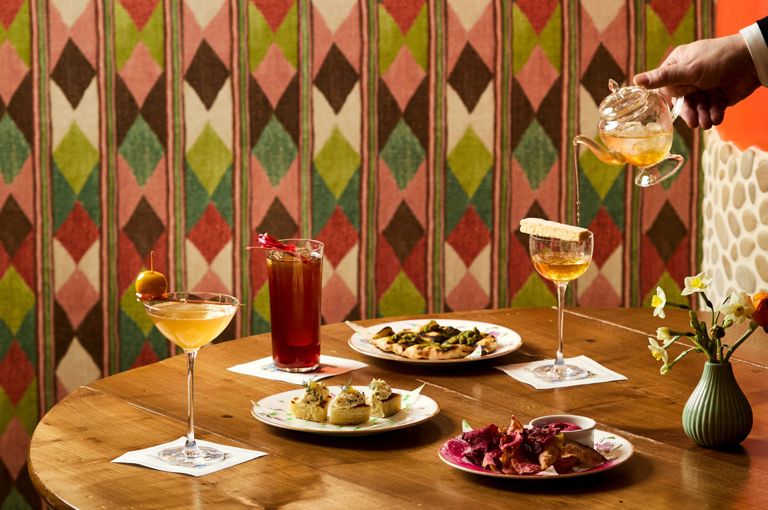 Wide image of cocktails and appetisers at Refuel