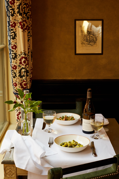 A wide shot of a main course of gnocchi on a plate at Brasserie Max