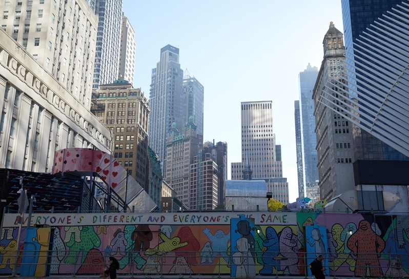 A street mural in Tribeca against a backdrop of skyscrapers