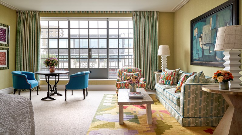 The living room area of the Soho Suite at The Soho Hotel