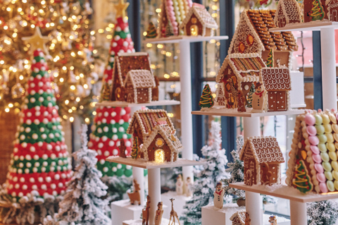 A portrait close up image of the multi teared gingerbread village at Ham Yard Hotel.
