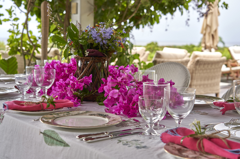 An image of the table set up for dining with Tall Trees Fine Bone Chinaware. At Rossferry, The Caribbean property run by Firmdale.