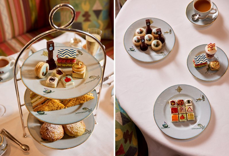 Two portrait images stitched together. On the left, a shot of a cake stand from above, displaying mini art-themed cakes on top. On the right, three plates of different colourful art themed cakes shot from above on a table.
