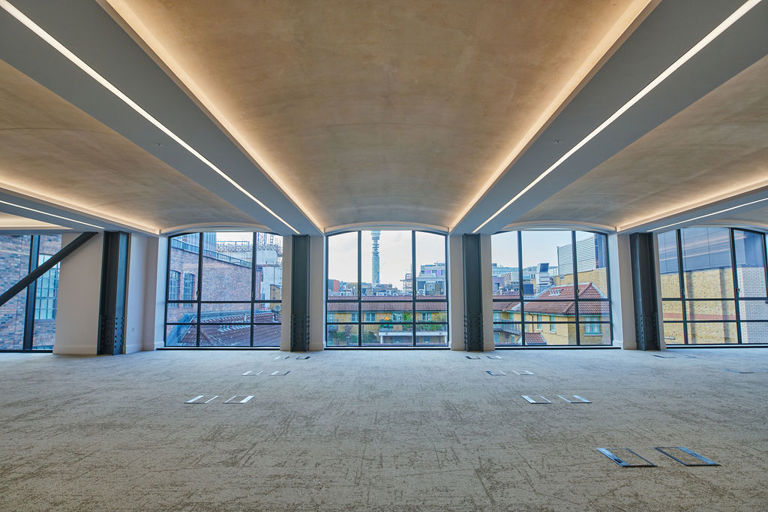 A wide shot of the view of the open plan office space at 9-11 Richmond Buildings