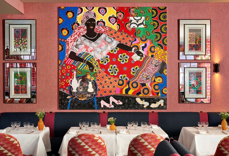 Seating Area with African-themed painting above